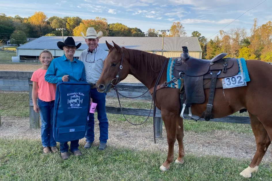 ken sharpe and Carrie O'Byrne standing with horse