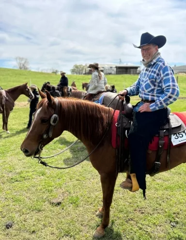 ken sharpe sitting on horse smiling
